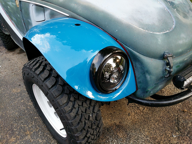 Illustration for article titled 1969 Baja Update: New front tires and wheels, fender paint test and headlight fitting.